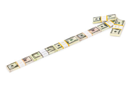 Arrow made of money isolated on white backgroundの写真素材