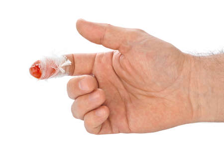Hand with blood and bandage isolated on white backgroundの写真素材