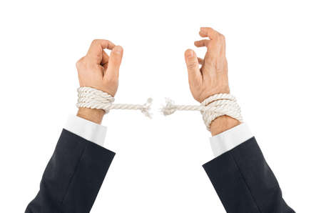Hands and breaking rope isolated on white backgroundの写真素材