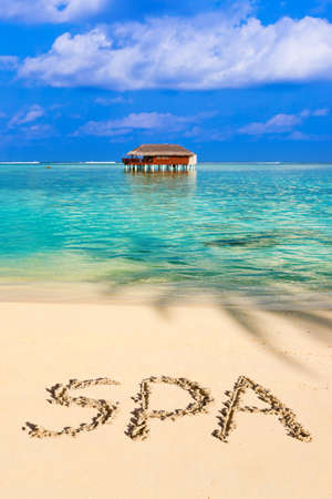 Word Spa on beach - concept holiday backgroundの写真素材