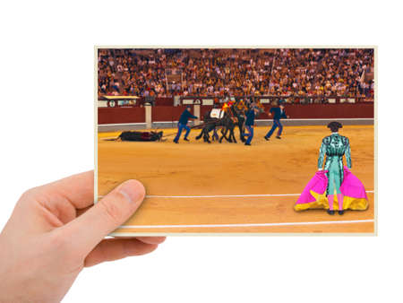 Corrida bullfighting (Spain) photography in hand (my photo) isolated on white backgroundの写真素材