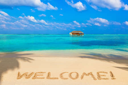 Word Welcome on beach - concept holiday backgroundの写真素材