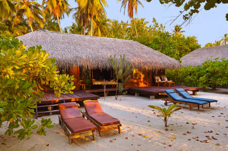 Beach bungalow - Maldives vacation backgroundのeditorial素材
