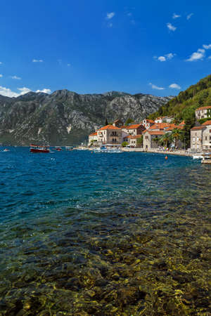 Village Perast on coast of Boka Kotor bay - Montenegro - nature and architecture backgroundの写真素材