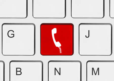 Computer keyboard with phone key - communication concept
