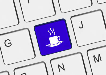 Computer keyboard with coffee key - business conceptの写真素材