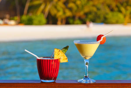 Fruit cocktail on Maldives beach - travel backgroundの写真素材