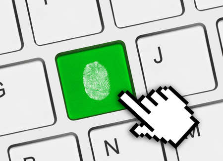 Computer keyboard with fingerprint - security conceptの写真素材