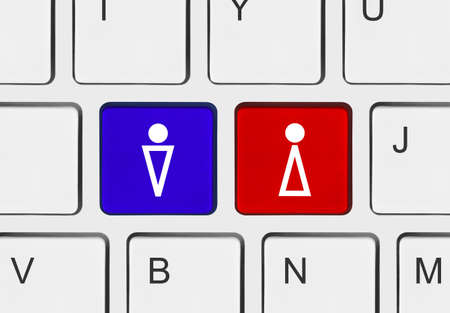 Computer keyboard with man and woman keysの写真素材