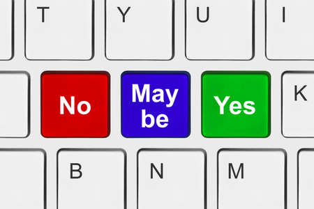 Computer keyboard with Yes No and Maybe keys - business conceptの写真素材