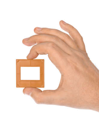 Photo frame for slide in hand isolated on white backgroundの写真素材