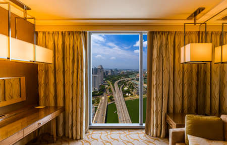 Hotel room and Singapore view - vacation concept backgroundのeditorial素材