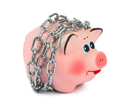 Piggy bank and chains isolated on white backgroundの写真素材