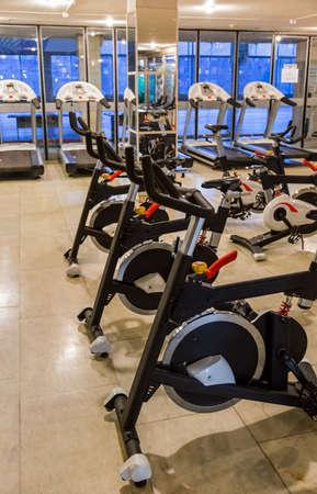Gym in fitness club - sport background