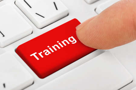 Computer notebook keyboard with Training key - technology backgroundの写真素材