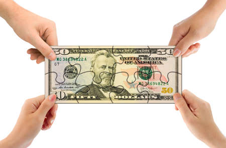 Hands and money puzzle isolated on white background