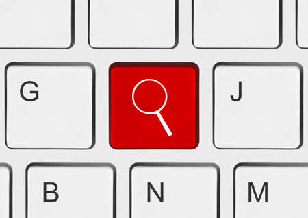Computer keyboard with search key - business conceptの写真素材