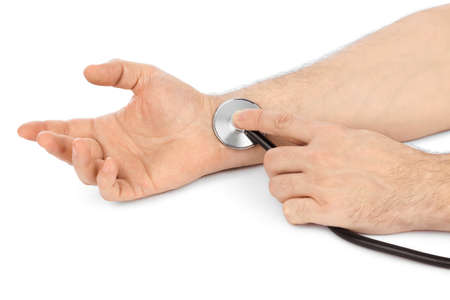 Hands and stethoscope isolated on white backgroundの写真素材