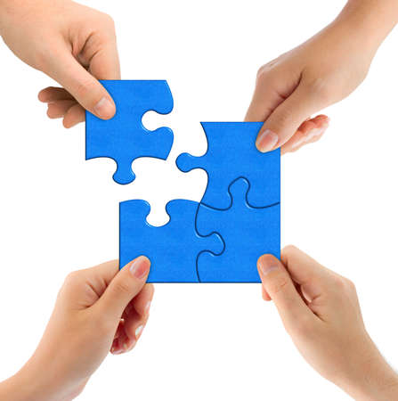 Hands and puzzle isolated on white background