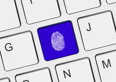 Computer keyboard with fingerprint - security concept