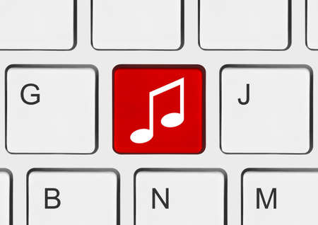 Computer keyboard with music keyの写真素材