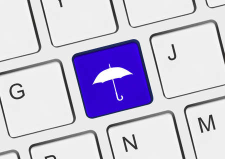 Computer keyboard with umbrella keyの写真素材