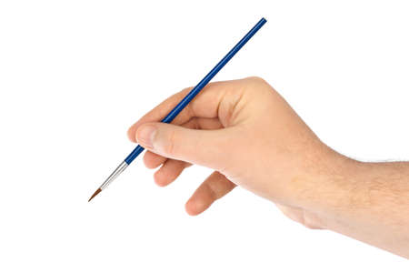 Hand with paintbrush isolated on white backgroundの写真素材