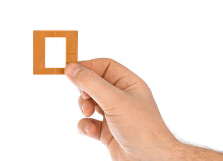 Photo frame for slide in hand isolated on white backgroundの写真素材