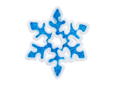 Toy snowflake - isolated on white backgroundの写真素材