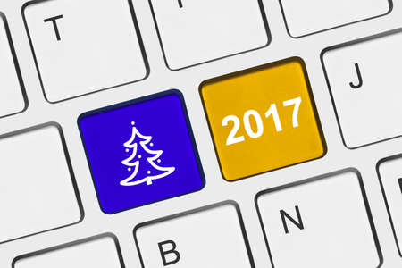 Computer keyboard with Christmas keys - holiday conceptの写真素材