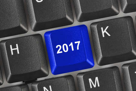 Computer keyboard with 2017 key - holiday conceptの写真素材