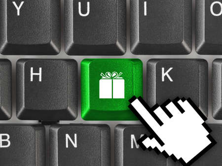 Computer keyboard with gift key - business backgroundの写真素材
