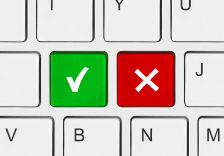 Computer keyboard with Yes and No keys - business concept