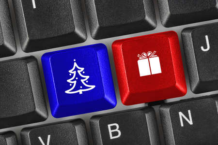 Computer keyboard with Christmas keys - holiday conceptの写真素材
