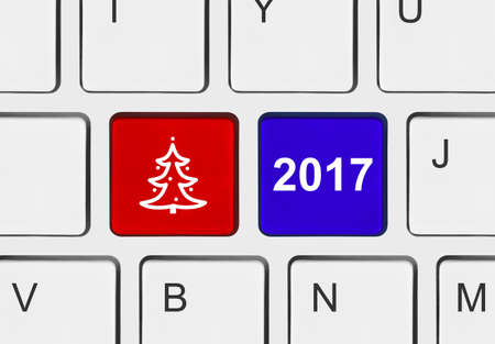 Computer keyboard with Christmas keys - holiday conceptの写真素材