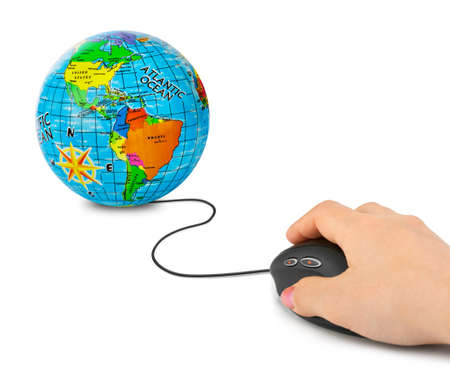 Hand with computer mouse and globe isolated on white backgroundの写真素材