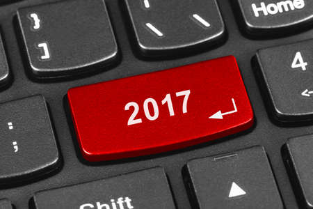 Computer notebook keyboard with 2017 key - holiday technology conceptの写真素材