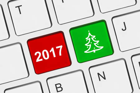 Computer keyboard with Christmas keys - holiday concept
