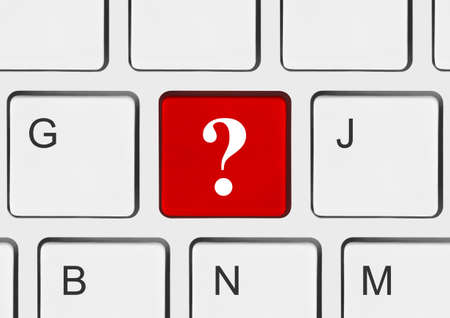 Computer keyboard with question key - business conceptの写真素材