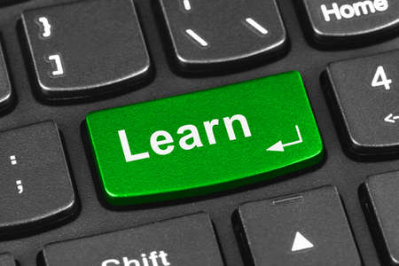 Computer notebook keyboard with Learn key - technology backgroundの写真素材