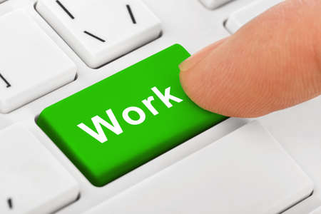 Computer notebook keyboard with Work key - technology background