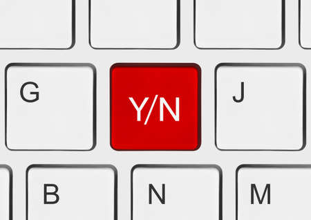 Computer keyboard with Yes and No key - business concept