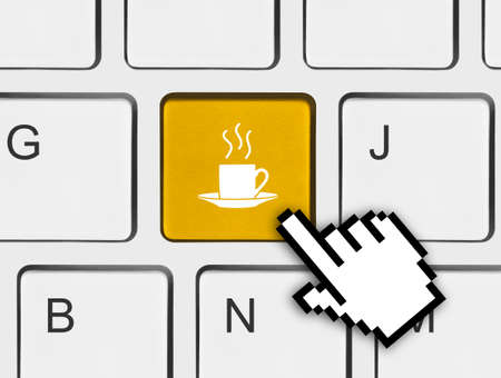 Computer keyboard with coffee key - business conceptの写真素材