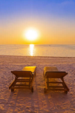 Loungers on Maldives beach - nature vacation backgroundの写真素材