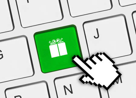 Computer keyboard with gift key - business backgroundの写真素材