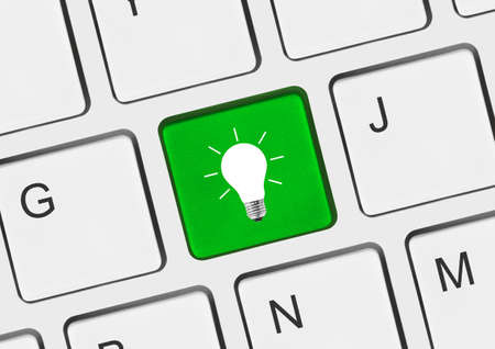 Computer keyboard with lamp key - technology background