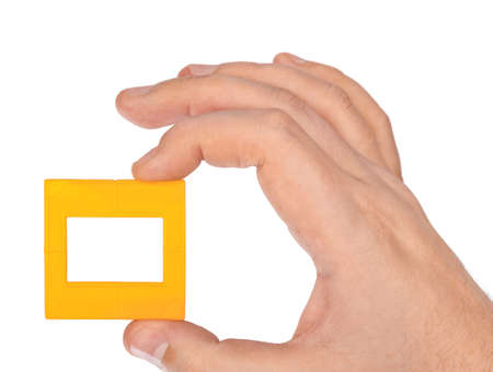 Photo frame for slide in hand isolated on white backgroundの写真素材