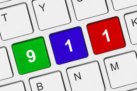 Computer keyboard with 911 key - technology background