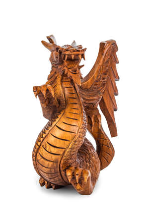 Toy wood dragon isolated on white backgroundの写真素材