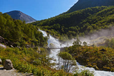 Waterfall near Briksdal glacier - Norway - nature and travel backgroundの写真素材